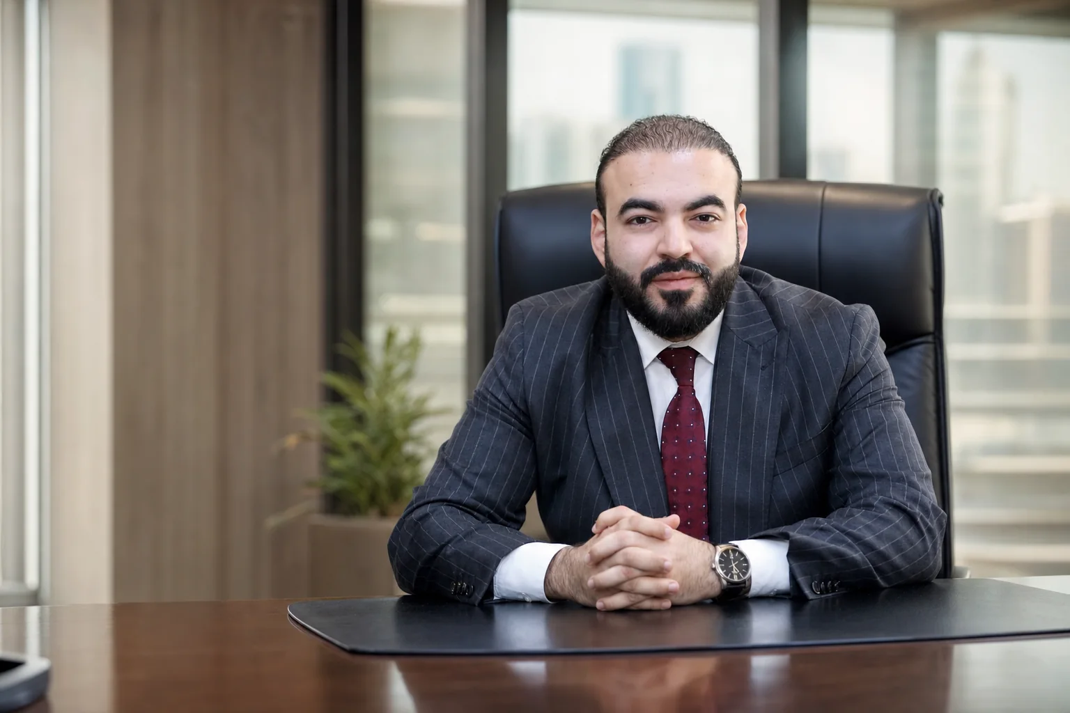 Omar Mosaad in his legal consultancy office