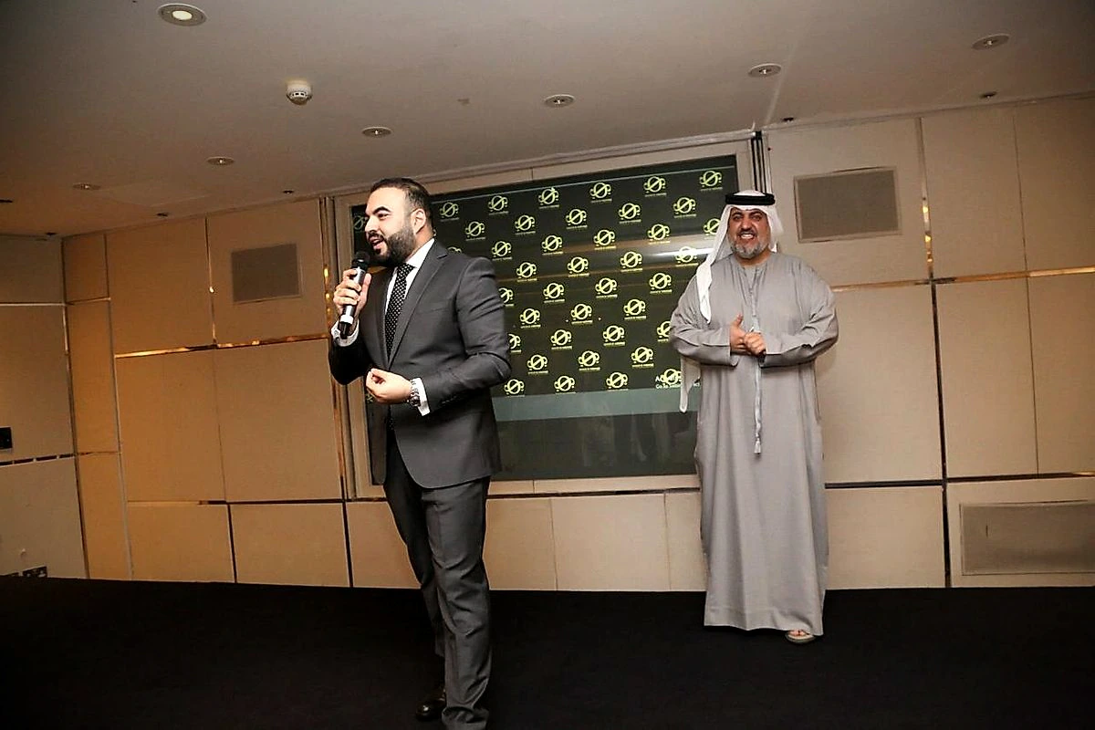 Omar Mosaad addressing a firm event